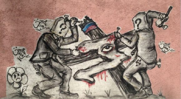 Photo d'une œuvre de Jerry : la crucifixion d'Haïti